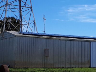 Coast FM Transmitter with solar panels of building roof