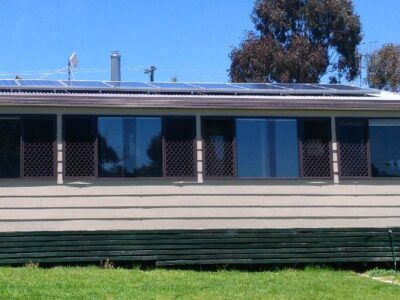 Landlord-Tenant Project - Frances with solar panels on roof