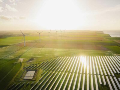 Solar panels and wind turbines, a part of Australia's Renewable Energy Revolution
