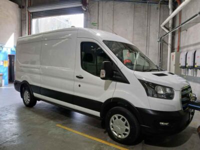 An electric van used by CERES Fair Food to deliver food boxes.
