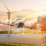 Shared electric vehicles charged by community renewable energy